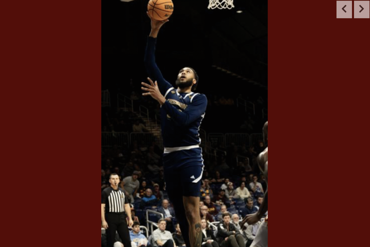 Emma Sutherland's photo of Makai Richards making a layup in the Mocs' 80-73 win over Loyola Chicago in the NIT semifinal round. The photoappeared on the front page of the sports section in the Chattanooga Times Free Press.